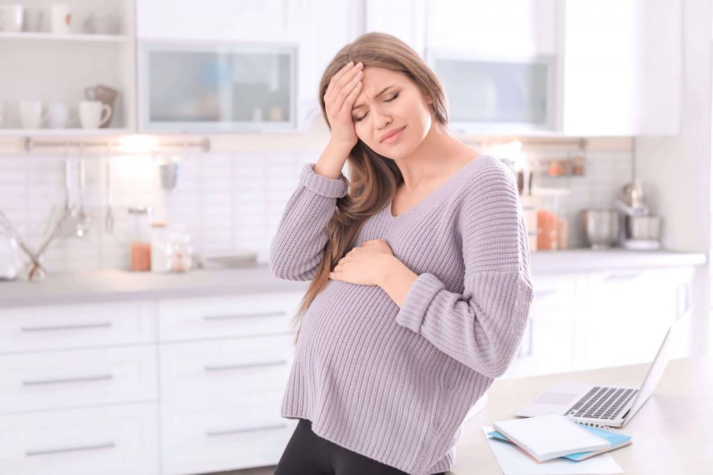 علائم هفته دوازدهم بارداری:سردرد