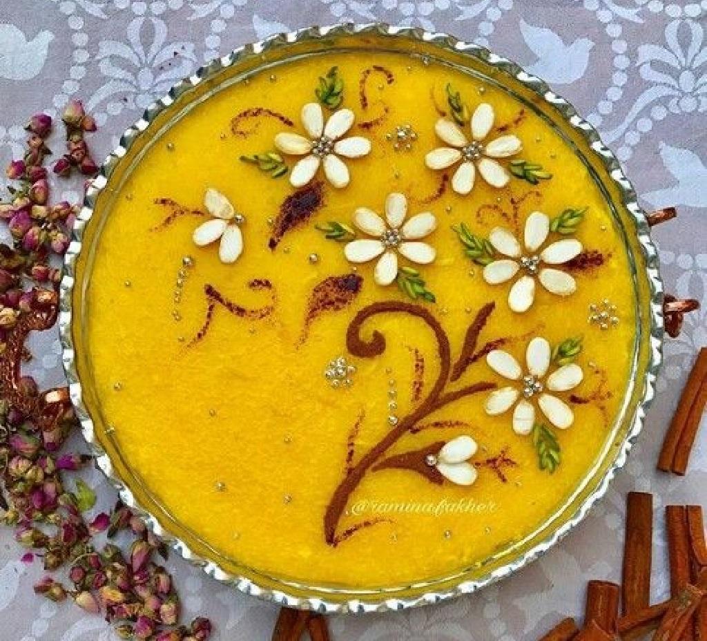 مدل تزیین شله زرد با خلال بادام و پسته 5